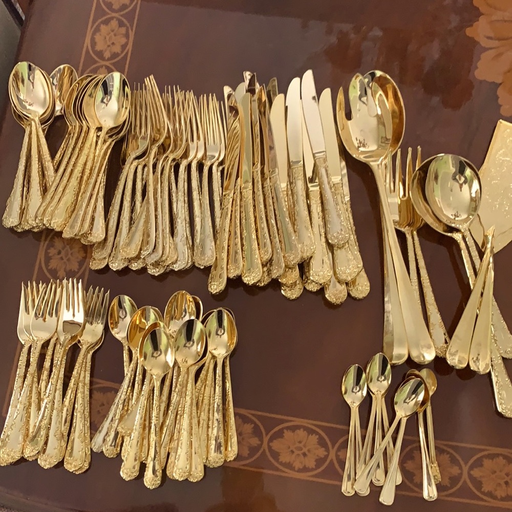 Golden color flatware by wMRogers & son made in China with flower design